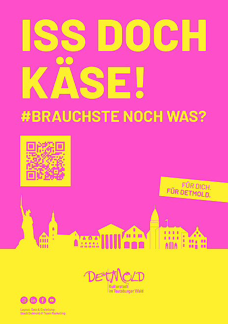 Gelbe Schriftzüge "ISS DOCH KÄSE!" und "#BRAUCHSTE NOCH WAS?" inklusive eines gelben QR-Codes auf pinkem Hintergrund